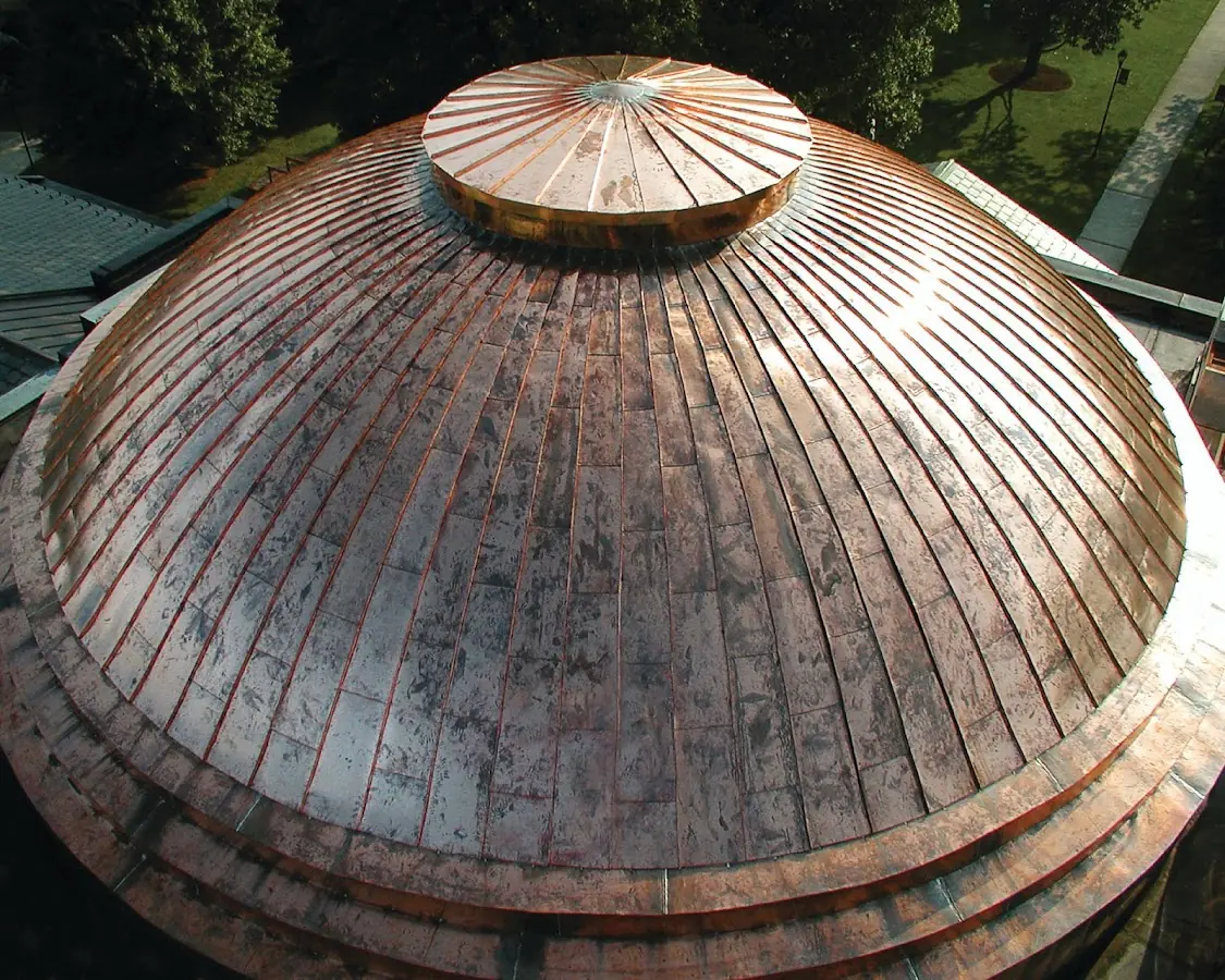 Craftsman Roofing crew installing a new roof in Quincy Center